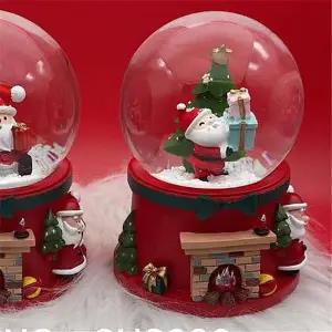 Boule de Noel avec Neige 13x8cm Papa Noel apporte les Cadeaux Résine 1
